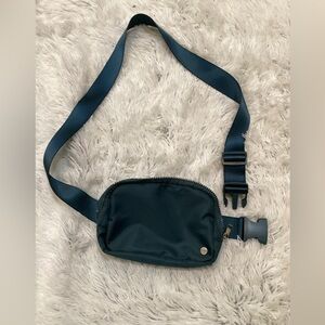 Studio NYC dark teal crossbody belt bag adjustable strap